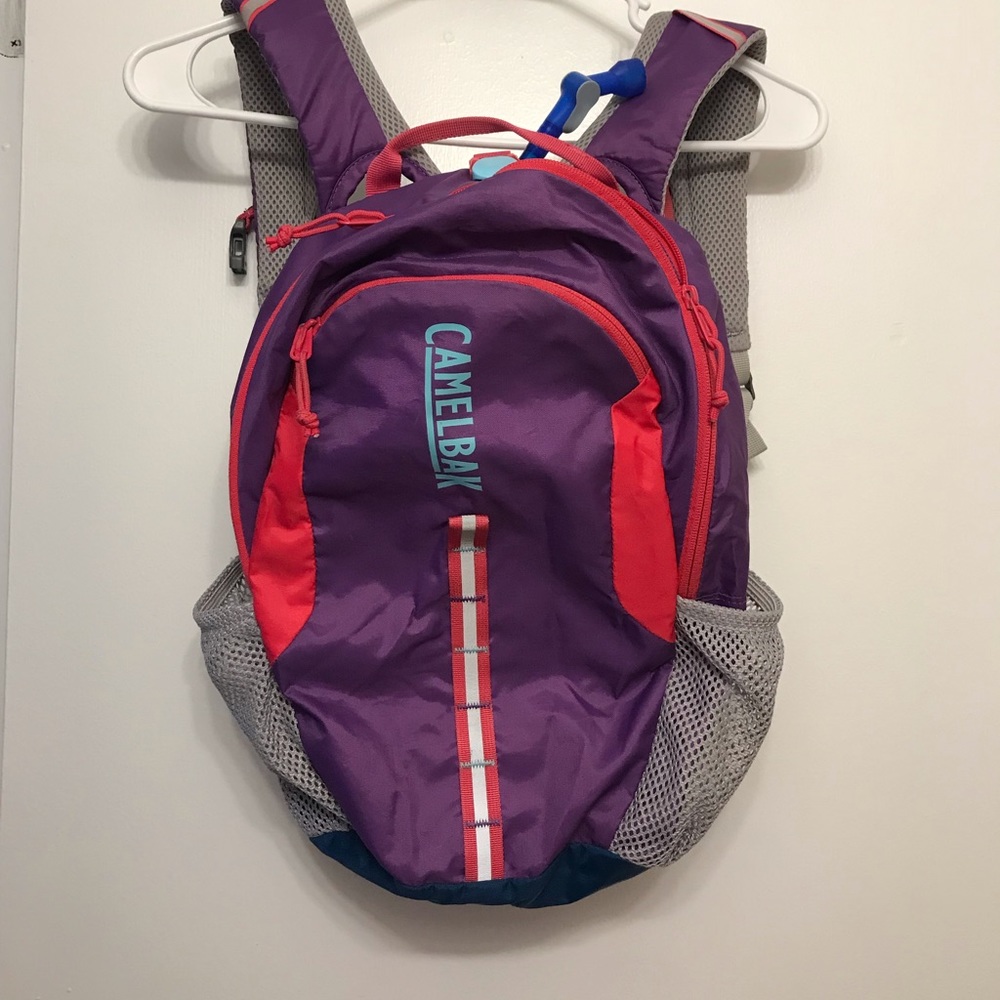 Camelbak water bladder hydration backpack 1.5 Liters purple and pink.
